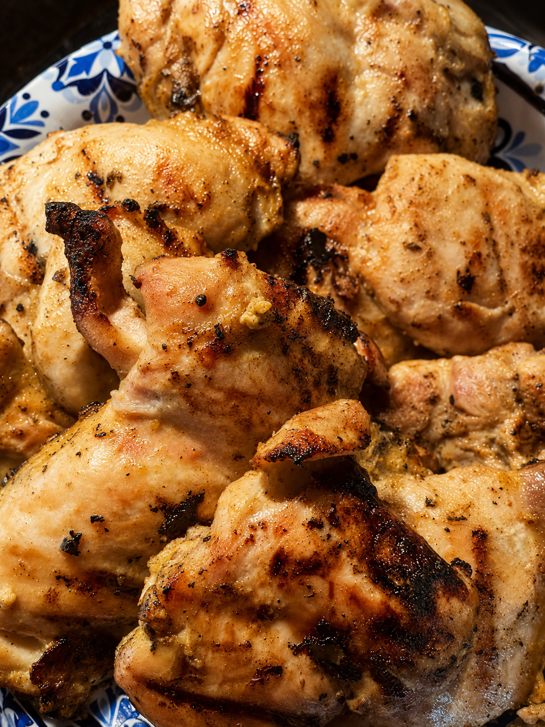 Grilled chicken thighs, close-up