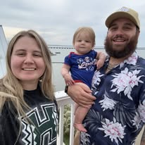 Gregg Winnington with Sarah and their daughter, Harper.