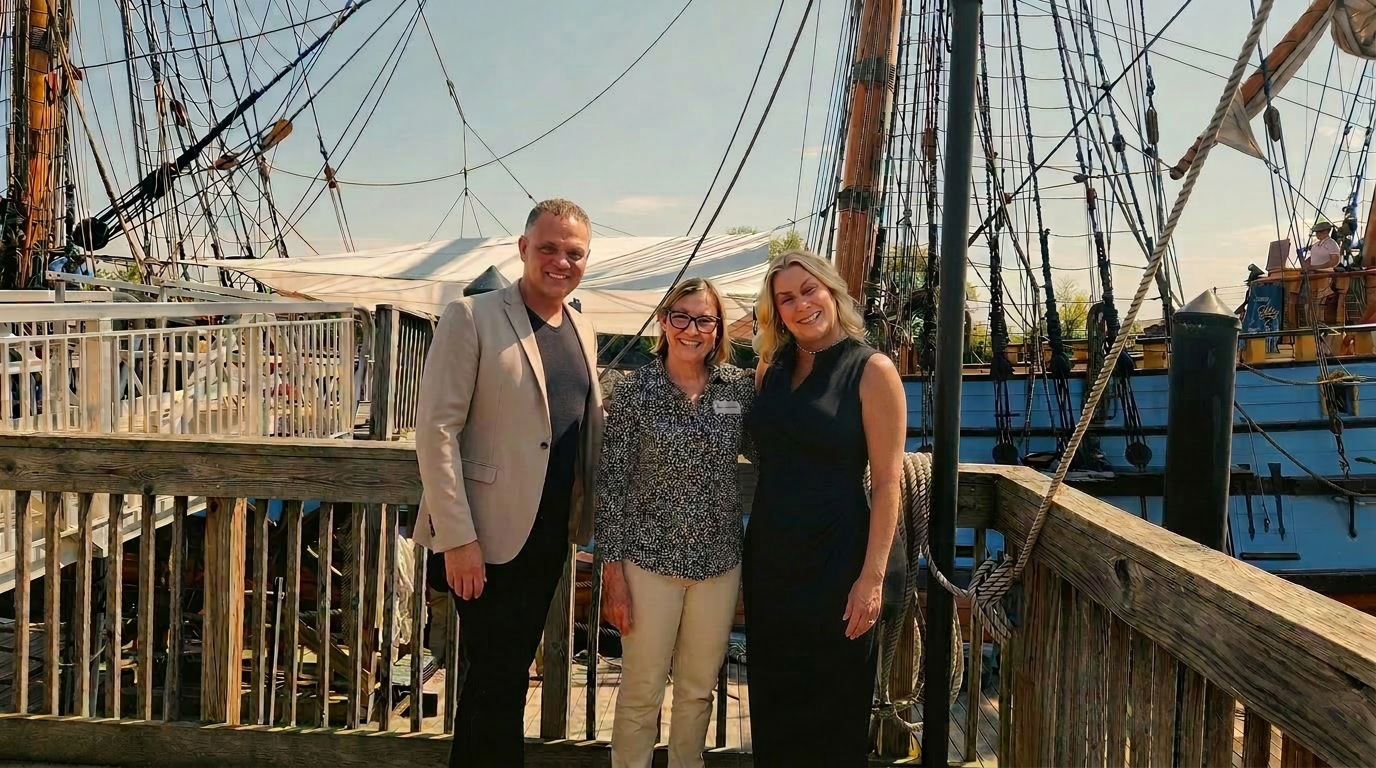 Christian Shane Dougherty, Jan Ross, and Diana Melody on the boarding ramp of the Kalmar Nyckel