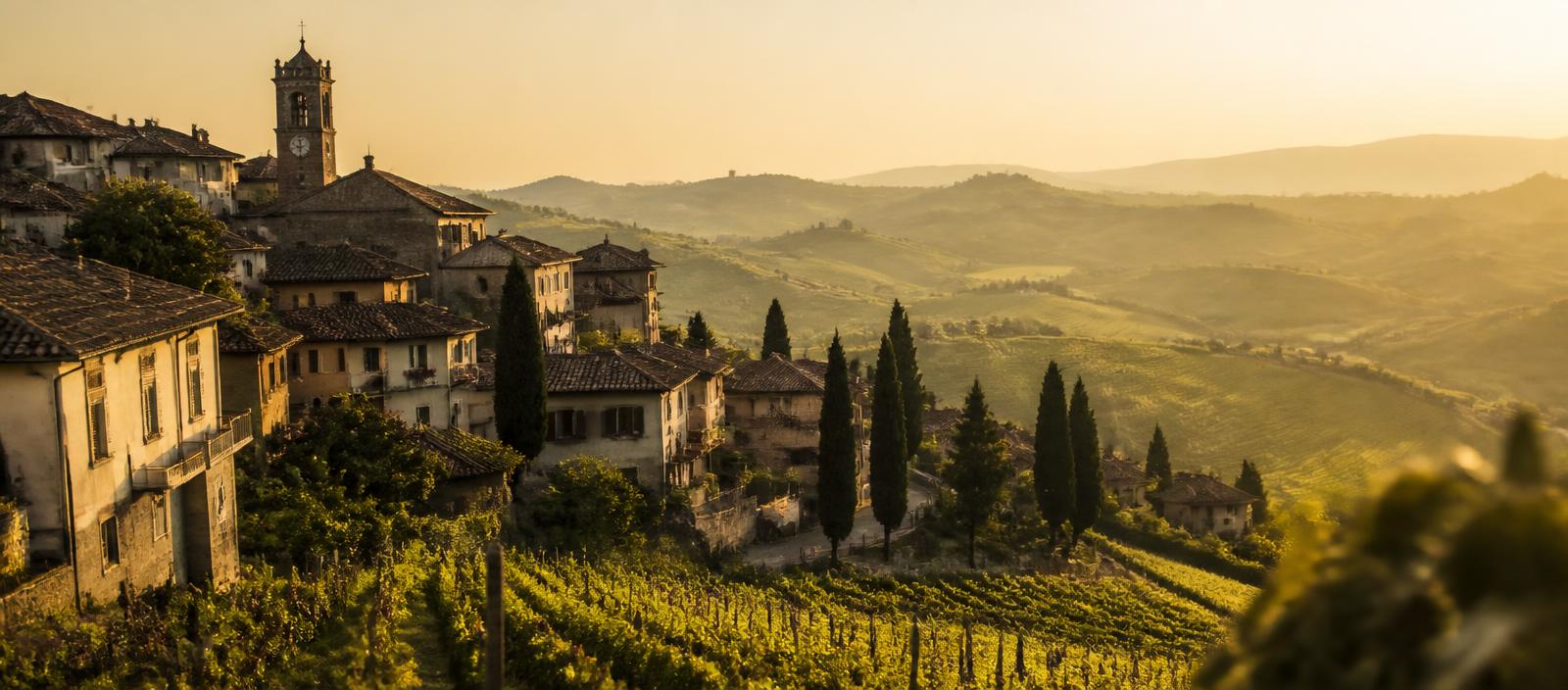Sunlit hillside village in the wine regions of Italy