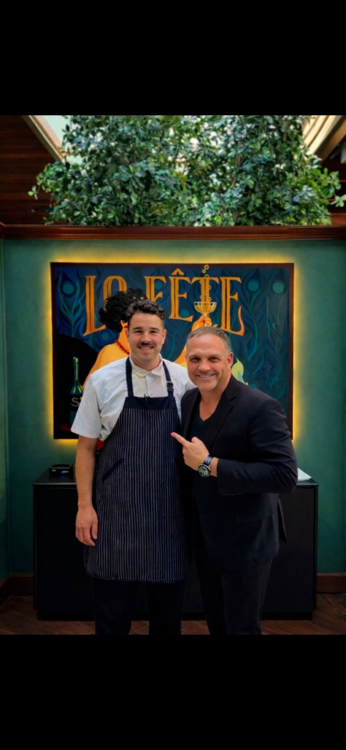 Christian Shane Dougherty, Publisher of City to Coast Magazine, with the chef at La Fête